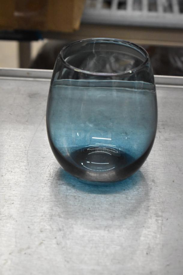 Acopa Pangea 15 oz. Blue Stemless Wine Glass, new, durable glass with slight indentations on surface, auction item.