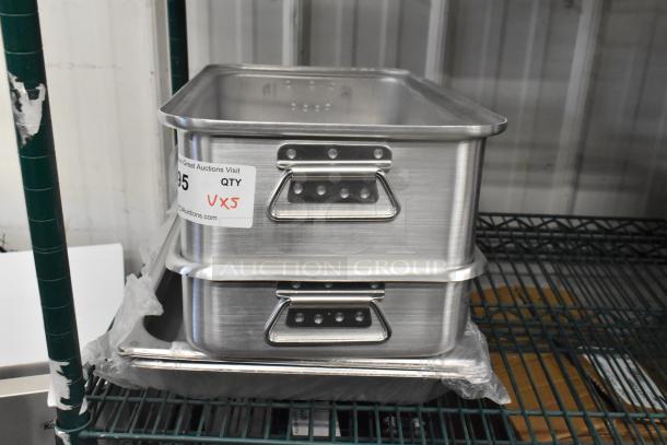 5 new stainless steel steam table pans, anti-jam, 24 gauge, 2 1/2" deep, with auction label "QTY VX5".
