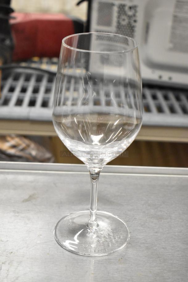 Brand new Stolzle Ultra 16 oz. all-purpose wine glass, part of a 6-pack. Clear, sleek design for versatile use.