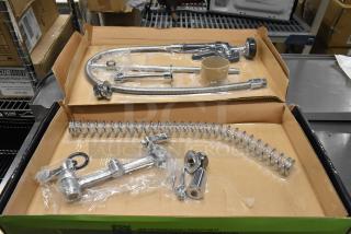 BRAND NEW Regency 600PRD8X pre-rinse faucet, 1.15 GPM, 8" centers, 44" hose. Scratch and dent condition. Deck-mounted.