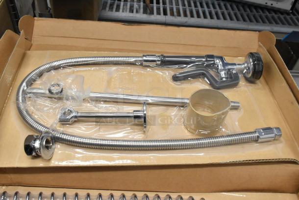 BRAND NEW Regency 600PRD8X deck-mounted pre-rinse faucet, 1.15 GPM, 8" centers, 44" hose, scratch and dent condition.