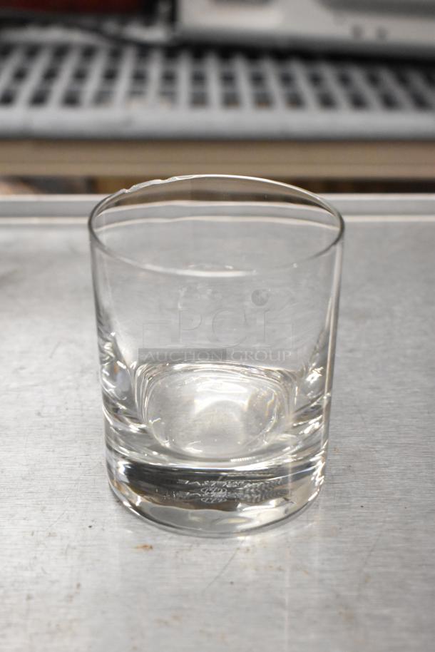 Libbey Modernist 7 oz. Rocks Glass, slight chip on rim, clear glass, customizable, ideal for cocktails.