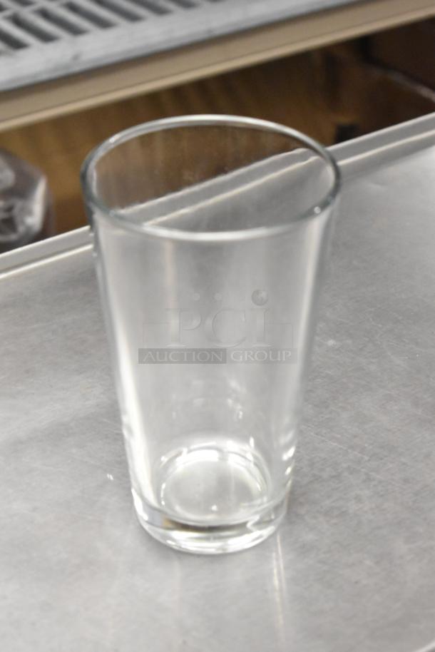 Acopa 16 oz. Customizable Mixing Glass, scratch and dent condition, clear glass, ideal for personal or business use.