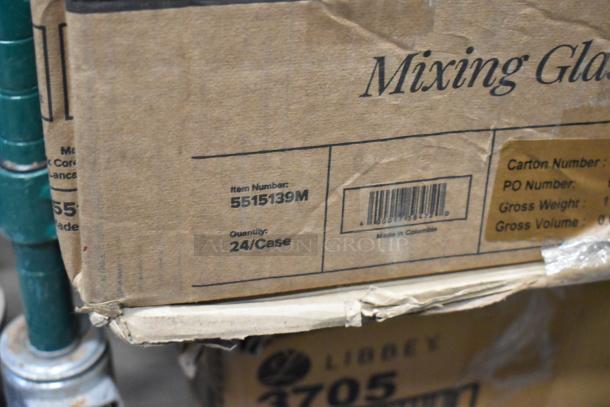 Cardboard box labeled "Mixing Glass" with item number 5515139M, quantity 24/Case, made in Colombia. Appears slightly worn.