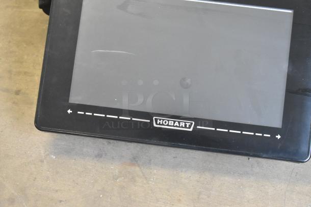 2017 Hobart HTi-7LH26 commercial countertop scale, touchscreen, minor surface wear. Model label: Hobart. 120/208-240V, 1 phase.