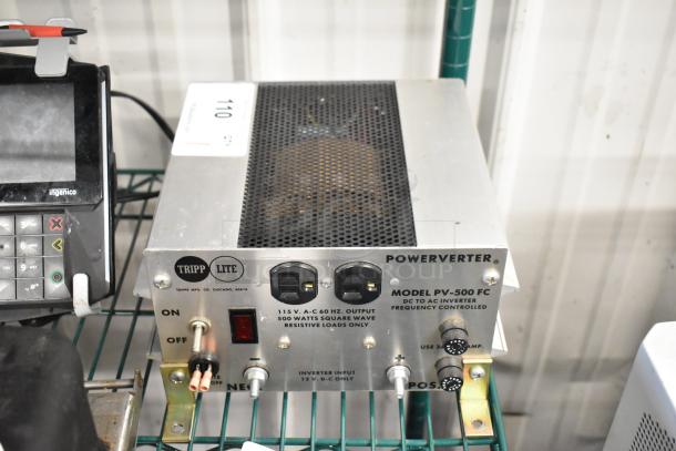 Tripp Lite PV-500 FC Powerverter, 115V, 1 Phase, metal body, dual outlets, on/off toggle, slightly worn.