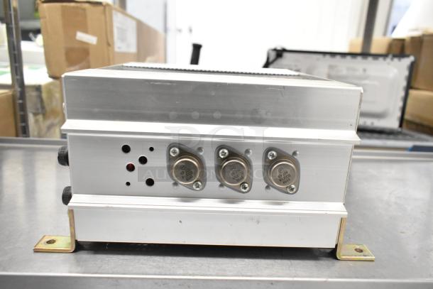 Tripp Lite PV-500 FC Powerverter, metal casing, 115V, 1 phase, side view with connectors, used condition.