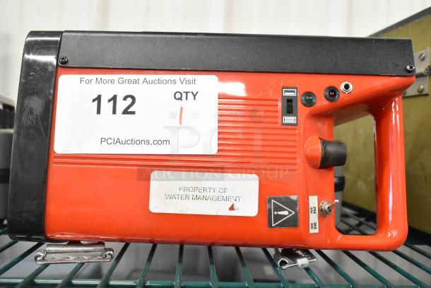 UVP UVSL-26P Rechargeable UV Lamp, 115 Volts, 1 Phase, red with control panel, "Property of Water Management" label.