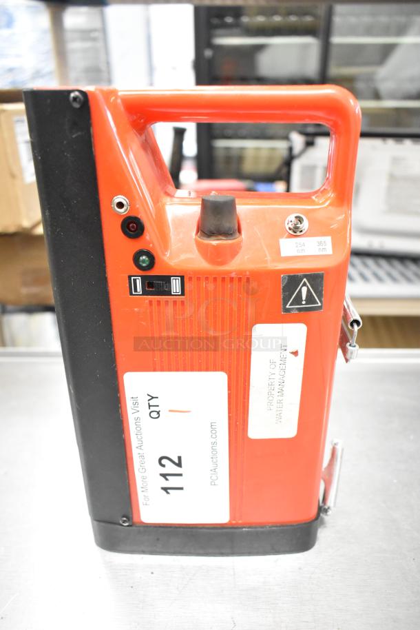 UVP UVSL-26P Rechargeable UV Lamp, red, 115V, 1 Phase. Shows controls, ports, and 254/365 nm labels; visible auction and property tags.