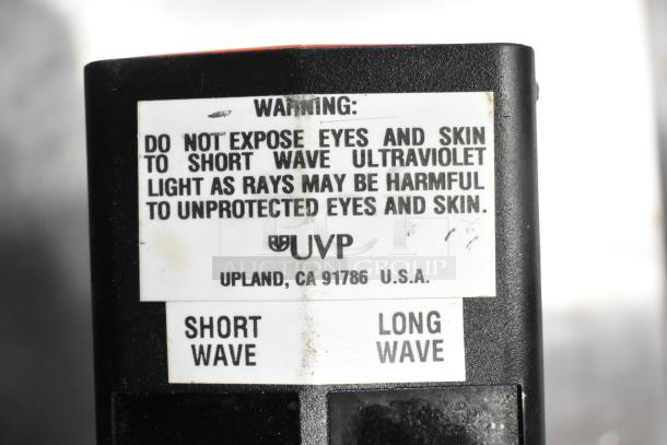 UVP UVSL-26P Rechargeable UV Lamp, 115V, 1 Phase, with short and long wave settings. Warning label visible.