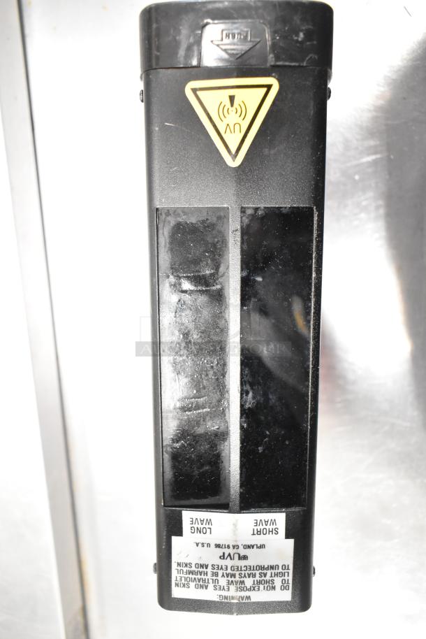UVP UVSL-26P Rechargeable UV Lamp, 115 Volts, 1 Phase. Features dual-wave UV light, rechargeable battery, signs of use.