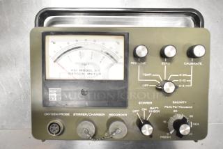 YSI Model 57 Oxygen Meter with controls for calibration, red line, temperature, and salinity; features for oxygen probe and stirrer.