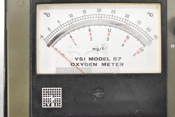 YSI Model 57 Oxygen Meter, analog display, measuring range in mg/l and °C, black casing, clear YSI branding, used condition.