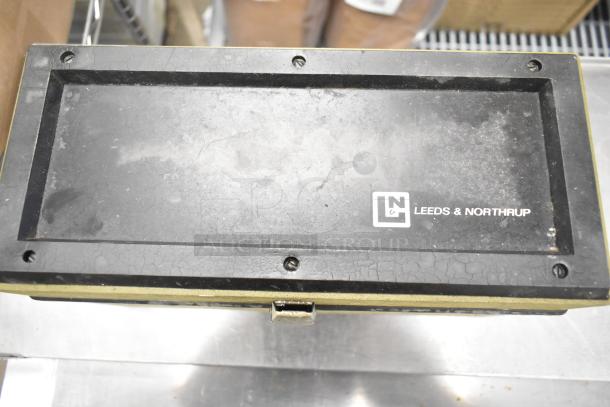Leeds & Northrup Specific Ion Meter in a worn black case, showing logo and latch.
