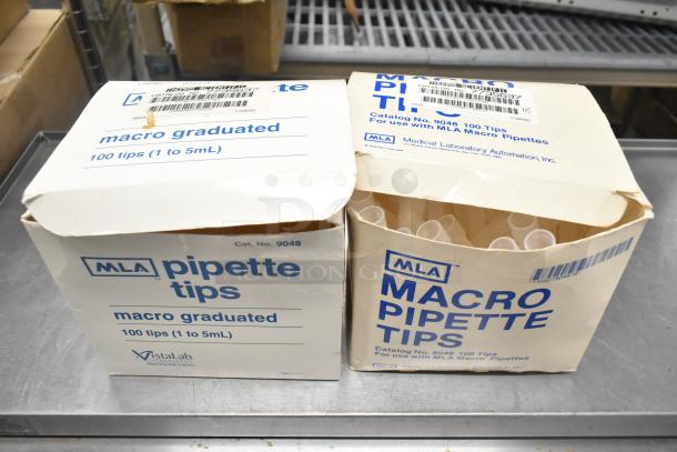 Boxes of MLA macro pipette tips, 100 tips per box, 1 to 5 mL. Cat. No. 9048. Open boxes with visible tips.