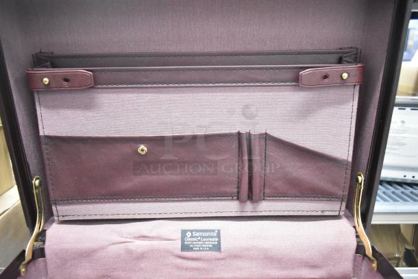 Samsonite Classic Laureate briefcase, burgundy interior, multiple compartments, visible label, excellent condition.