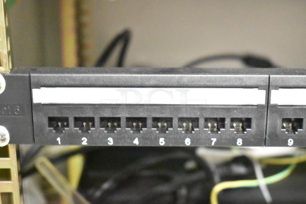 2 BlackShields DC0300 white metal air-conditioned technology cabinets with rack units, showing ports labeled 1-9.