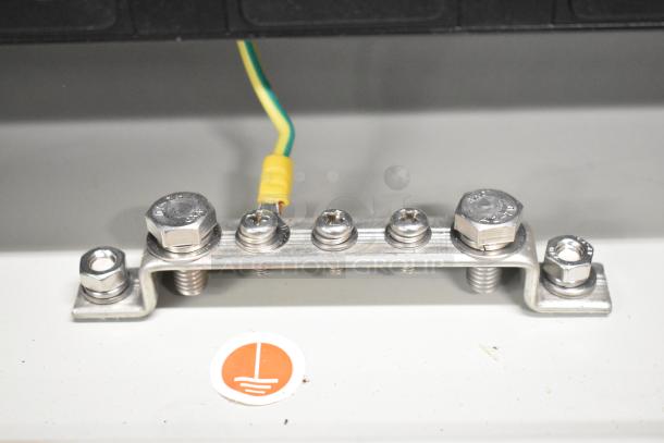 2 BlackShields DC0300 white metal technology cabinet with air conditioning, includes rack unit and visible ground connections.