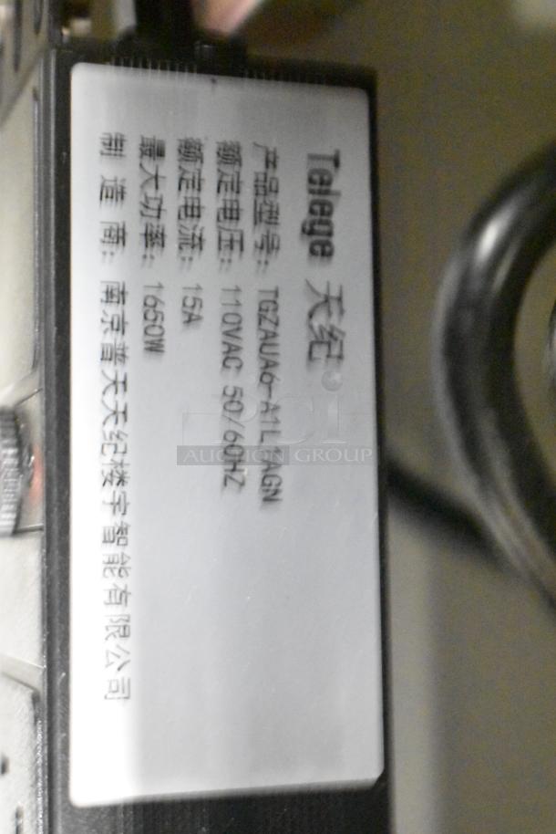 2 BlackShields DC0300 white metal technology cabinets with rack units; air-conditioned, model label visible.