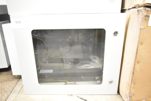 BlackShields DC0300 white metal air-conditioned cabinet with rack unit. Features glass door, lacks key, tag reads "117."