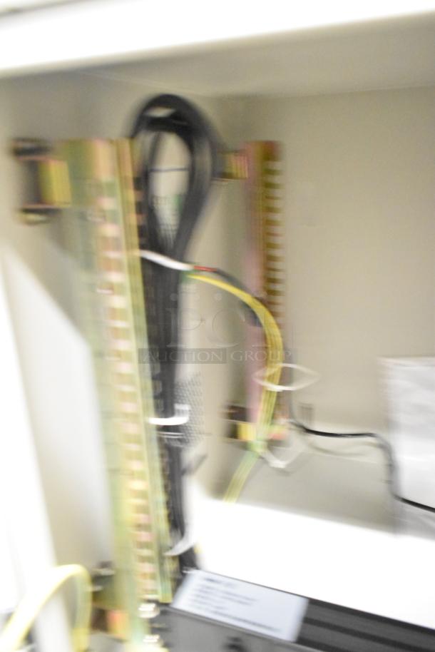 BRAND NEW SCRATCH AND DENT. BlackShields DC0300 white metal cabinet interior, features wiring and air conditioning tech.