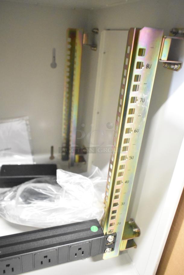 Brand new BlackShields DC0300 white metal technology cabinet with air conditioning, minor scratches and dents visible.