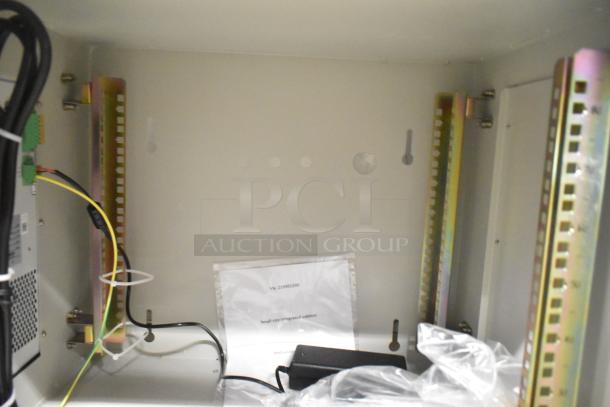 BRAND NEW SCRATCH AND DENT BlackShields DC0300 white metal technology cabinet with air conditioning, internal wiring, and fittings.