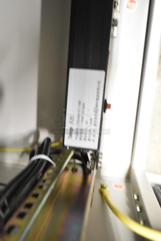 BRAND NEW SCRATCH AND DENT! BlackShields DC0300 white metal air-conditioned tech cabinet, interior wiring visible.