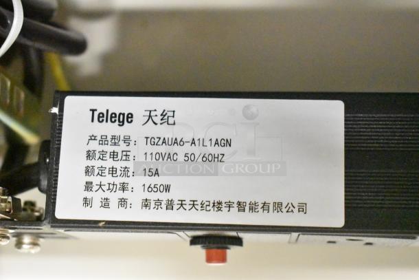 Label on BlackShields DC0300 cabinet. Text includes model TGZAUA6, 110VAC, 15A, 1650W. Manufacturer details in Chinese.