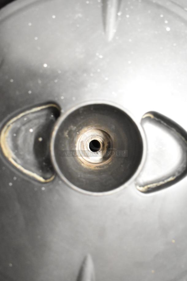 Close-up of the lid of a Bunn SH SERVER stainless steel coffee satellite server showing the central opening and handle.