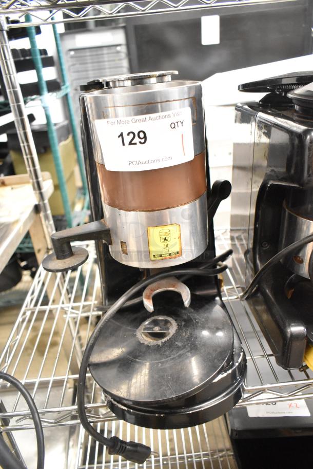 Metal commercial countertop espresso bean grinder, 115 volts, 1 phase. Features visible labels and moderate wear.
