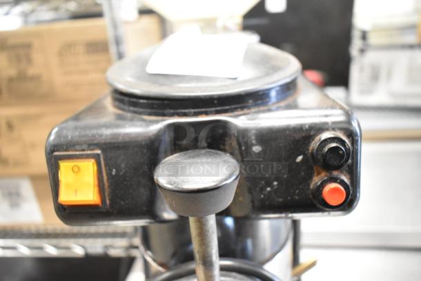 Metal commercial countertop espresso bean grinder, 115 volts, 1 phase, features control buttons, good condition.