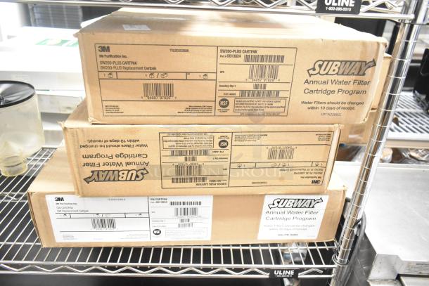 Three 3M SW260-PLUS water filtration cartridge sets in original packaging, part of Subway's Annual Water Filter Program. Boxes show minor wear.