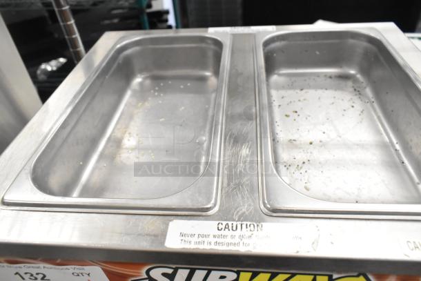 Duke CSW-2-T-AM stainless steel commercial countertop food warmer in used condition. Dual pans, 120 volts, 1 phase. Caution label visible.