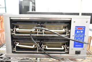 Prince Castle DHB-DDB stainless steel holding bin, 120V, 1 phase. Features dual shelves and digital controls. Caution: hot label visible.