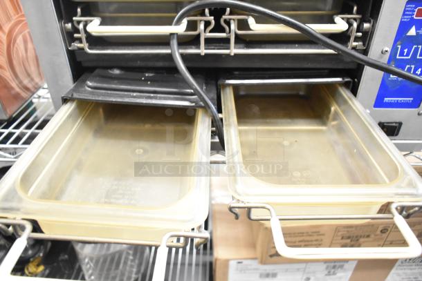 Prince Castle DHB-DDB countertop holding bin, stainless steel, dual trays, 120V, 1 phase. Good condition. Visible control panel.