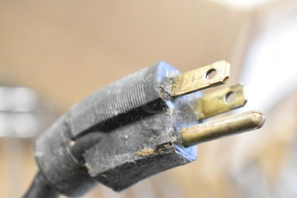 Close-up of a three-prong power plug, part of the Prince Castle DHB-DDB commercial holding bin, 120 Volts, 1 Phase.