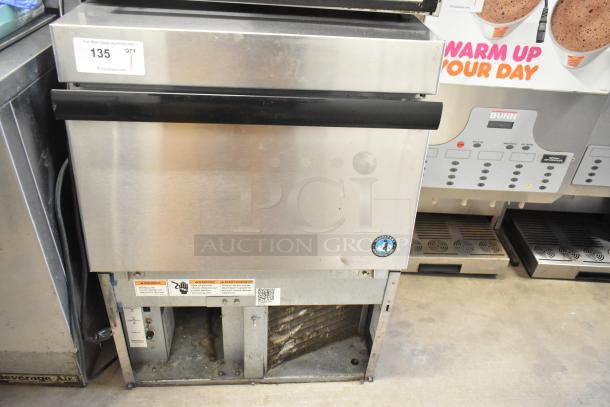 Hoshizaki F-330BAH-C stainless steel undercounter ice maker, 115-120V, self-contained, minor wear, auction tag visible.