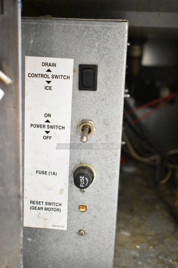 Hoshizaki F-330BAH-C ice maker control panel with power switch, control switch for ice/drain, and 1A fuse.
