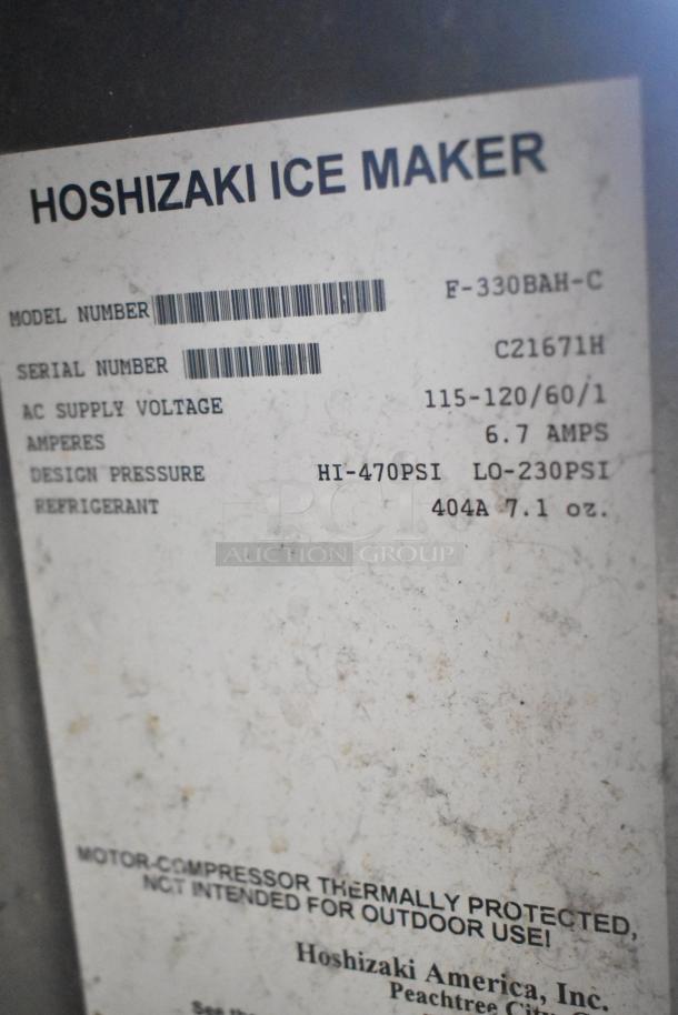 Hoshizaki F-330BAH-C stainless steel ice maker label showing model, serial number, voltage, and specifications.