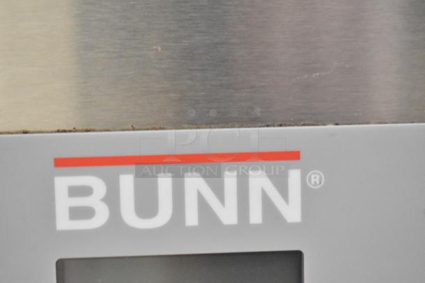 Bunn IMIX-5 stainless steel commercial countertop cappuccino machine. Visible Bunn logo. 120/208-240V, 1 phase power.