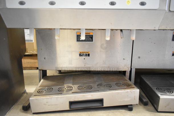 Bunn IMIX-5 stainless steel countertop cappuccino machine with visible warning labels. 120/208-240V, 1 phase, commercial use.