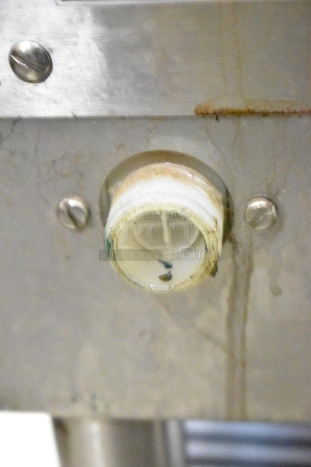 Bunn IMIX-5 stainless steel cappuccino machine, showing minor wear, close-up of connection component. 120/208-240V, 1 phase.