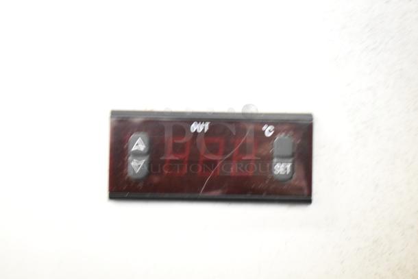 Digital display panel of KoolMore SD105B cooler showing temperature settings, with control buttons for adjustments.