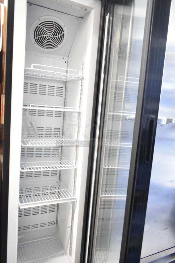 KoolMore SD105B commercial cooler, single door, metal, 115 volts, 1 phase. Includes multiple wire shelves, fan visible inside.