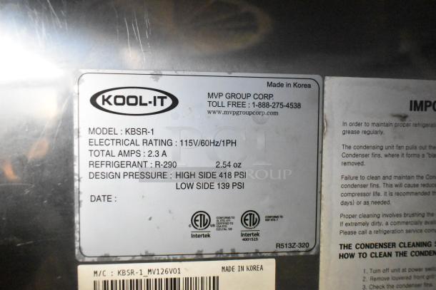 Kool-It KBSR-1 stainless steel commercial single door cooler label, model specifications, and contact details.