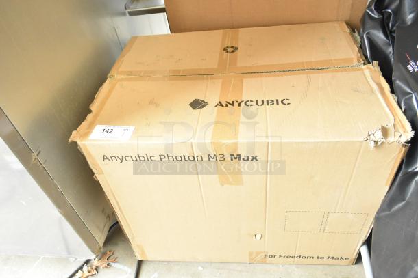 Brand new Anycubic Photon M3 Max 3D Printer box with minor dents. Visible box label reads "Anycubic Photon M3 Max."