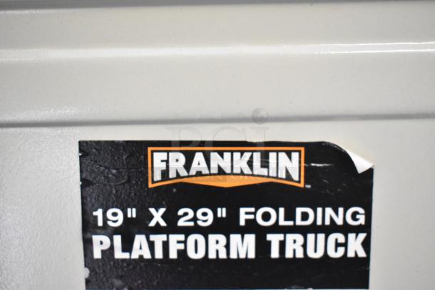 Franklin 19"x29" folding platform truck label. Visible branding and dimensions on black background.