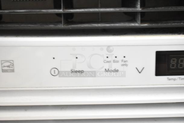 Electrolux FFRE1033U1 window air conditioner controls, showing mode, sleep, and temperature settings, 115V, 1 phase.