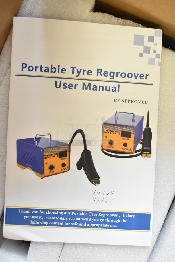 Brand new portable tyre regroover with user manual. CE approved. Slight scratch and dent, shown in packaging.